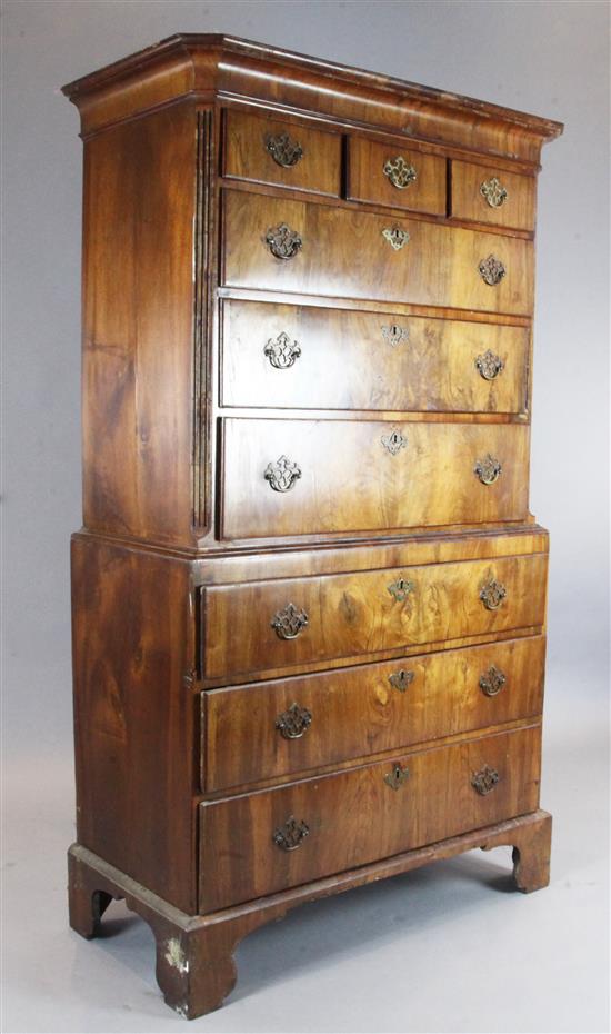 A George II walnut chest on chest, W.3ft 6in. D.1ft 8in. H.6ft 1in.